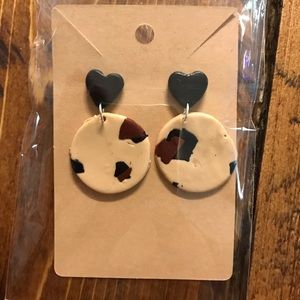 Heart cheetah studs